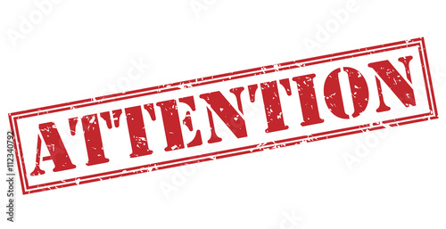 attention red stamp on white background