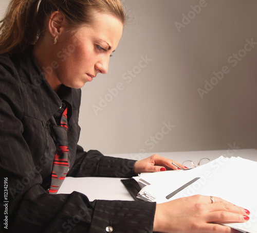 tired and exhausted   woman working with documents (psychologica photo