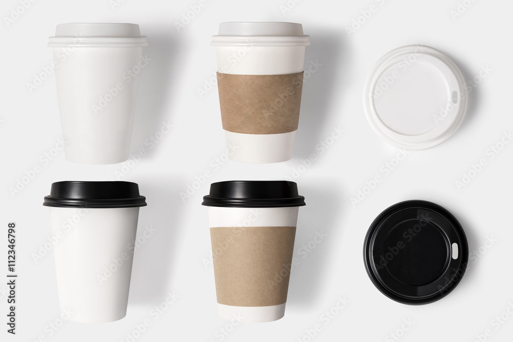 Design concept of mockup coffee cup set and lid set on white bac Design concept of mockup coffee cup set and lid set on white bac