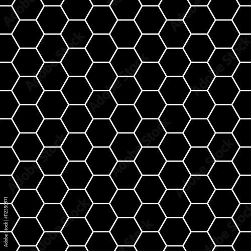 Black and gray carbon background with hexagons. 