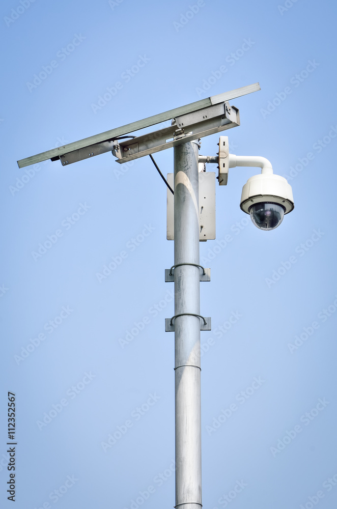 CCTV camera security with Solar panel in a big city CCTV camera security with Solar panel in a big city