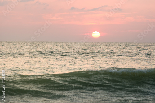 wave and sunset