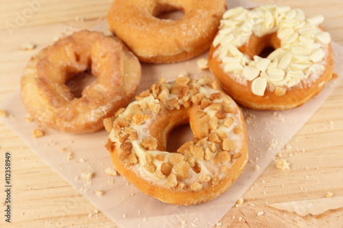 Donuts on wooden background