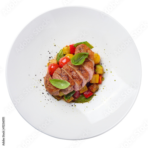 duck fillet with vegetable ragout. Isolated