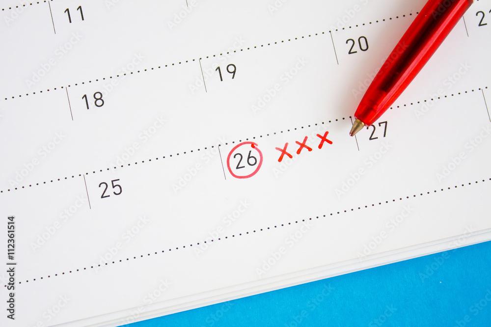 Red circle and xxx sign mark on the calendar
