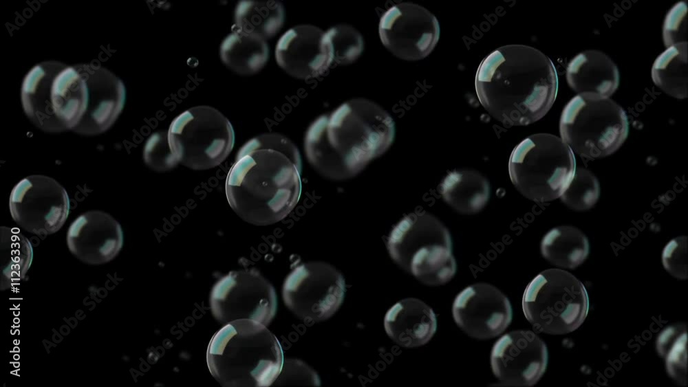 Computer generated video animation of seamless loop bubbles floating on black