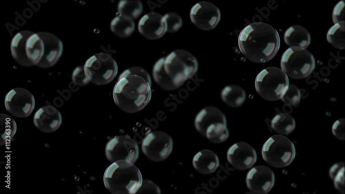 Computer generated video animation of seamless loop bubbles floating on black