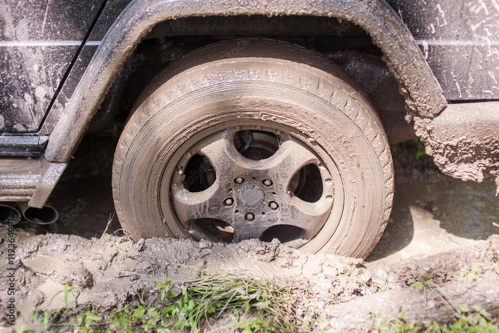 SUV got stuck in the mud, wheel closeup