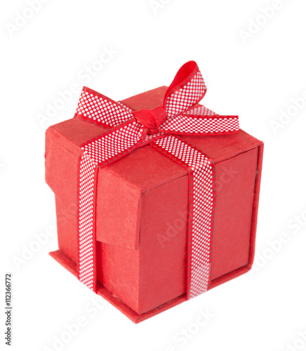 Red gift box on a white bac...