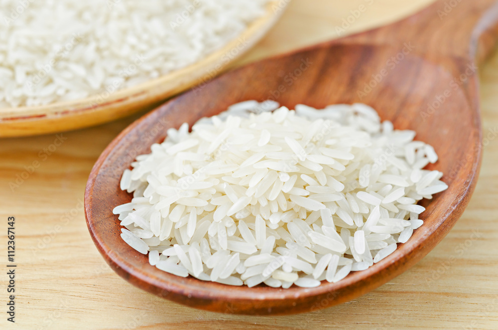Raw rice on wooden. Raw rice on wooden.