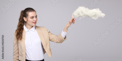 Young woman and cloud, cloud computing concept photo