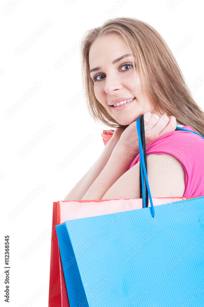 Portrait of young smiling female holding shopping or present bag