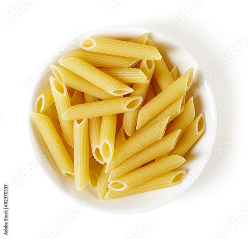 pasta in bowl isolated on white, from above