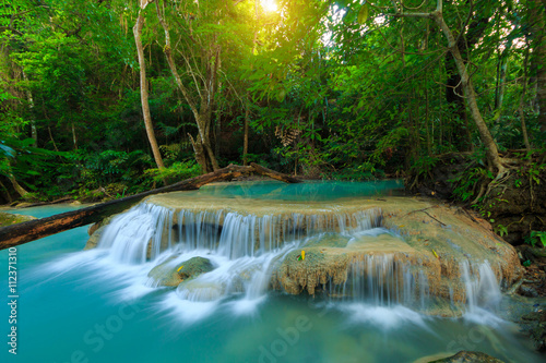 Erawan Waterfall, beautiful waterfall in deep forest, Erawan National Park in Kanchanaburi, Thailand © cakeio