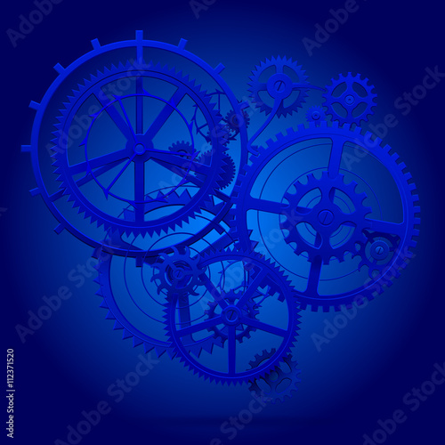 Blue gear wheels of clockwork in blue light