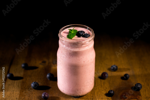 Close up of fruit yougurt smoothie - health living concept.
