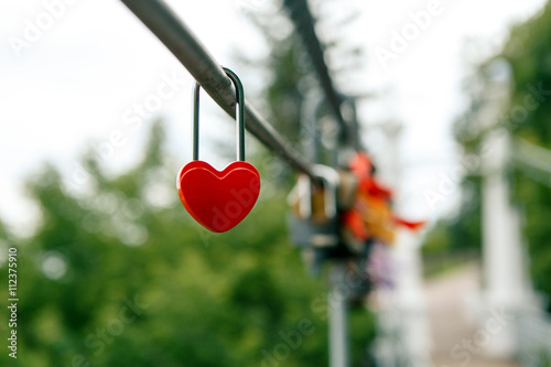 The closed red padlock in the form of heart © bestsenny