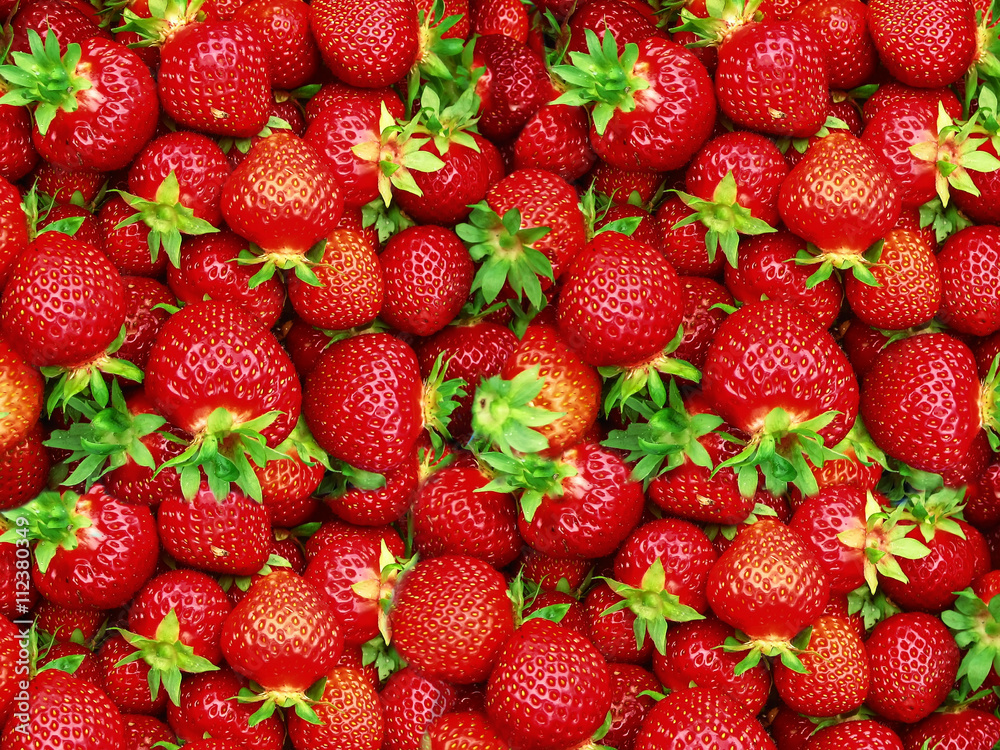 Red ripe strawberries for the background. Red ripe strawberries for the background.