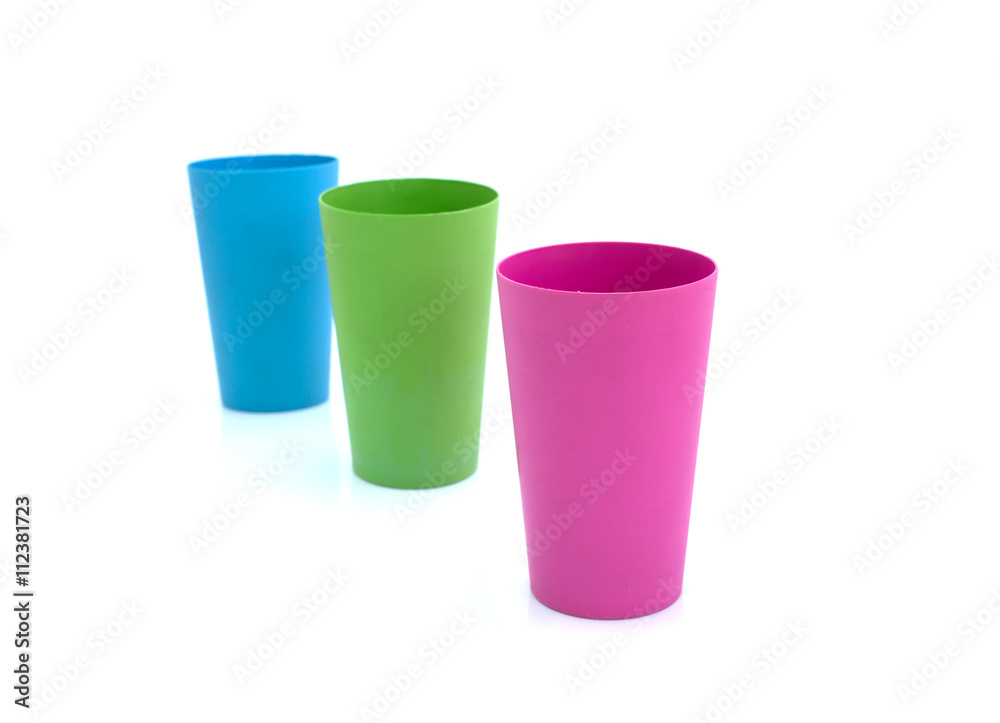 Plastic glass of various color isolated on white background Plastic glass of various color isolated on white background