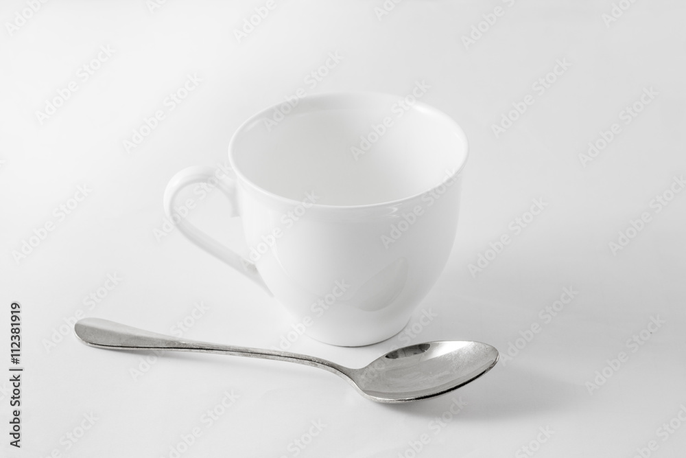 Cup of coffee and spoon