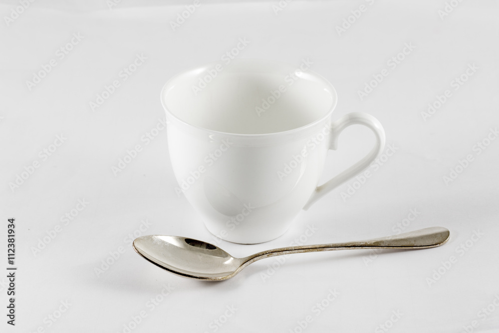 Cup of coffee and spoon Cup of coffee and spoon