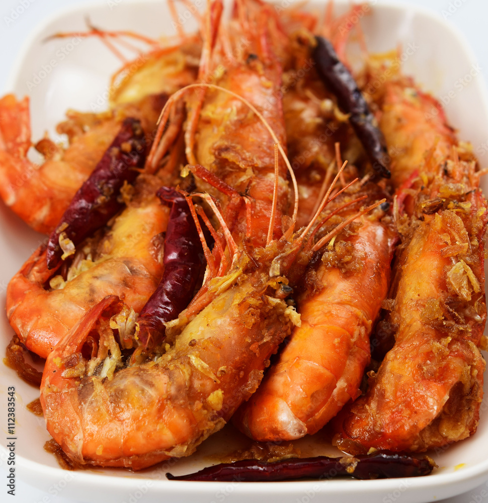 close up, King prawns in sweet tamarind sauce and deep fried gar close up, King prawns in sweet tamarind sauce and deep fried gar