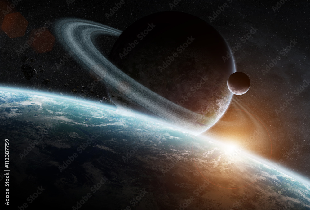 Obraz premium Sunrise over group of planets in space