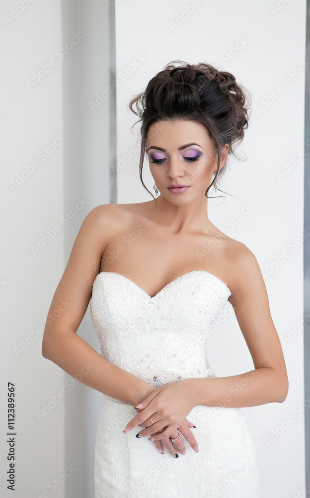 Portrait of young beautiful bride over white background Portrait of young beautiful bride over white background