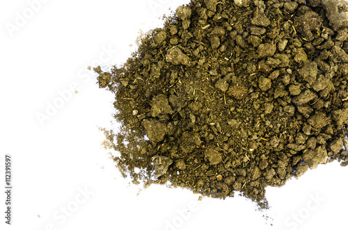 close-up dry cow manure isolated on white background,copy space