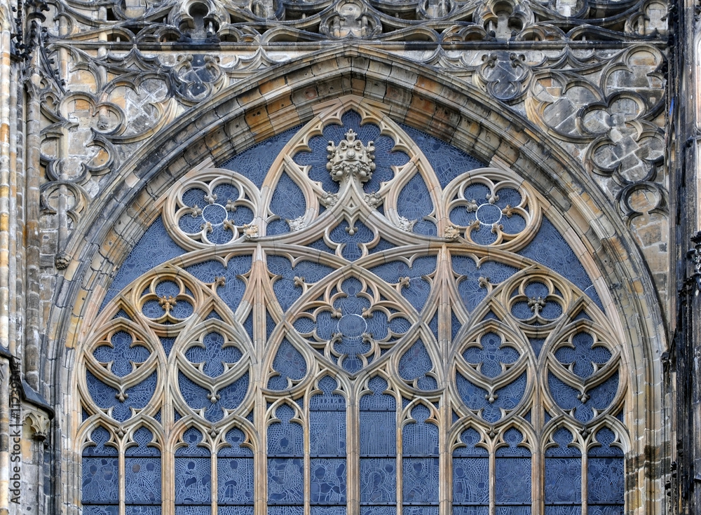 Detail of window decoration of the Gothic St. Vitus Cathedral in Prague, Czech Republic. Patterns on the arched window.