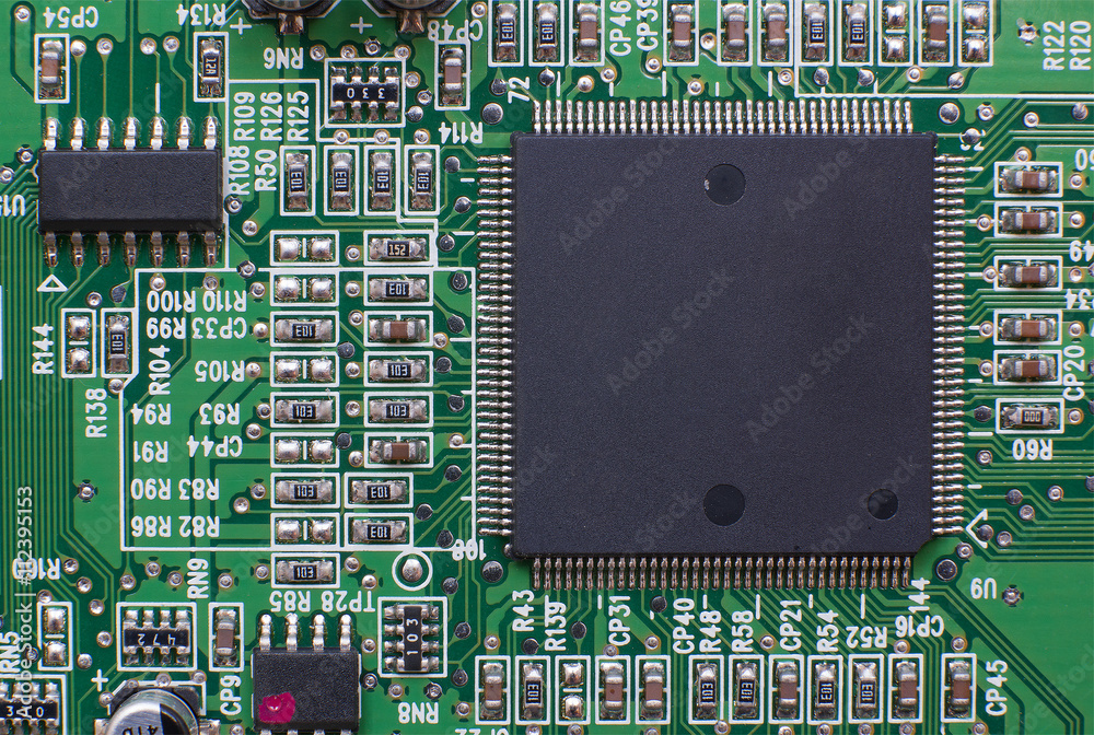 Printed circuit board with electronic components. Computer and networking communication technology concept. Printed circuit board with electronic components. Computer and networking communication technology concept.