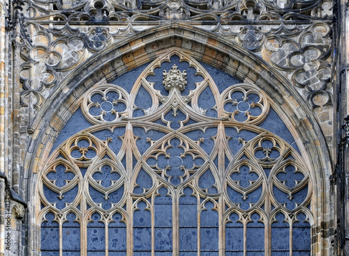 Detail of window decoration of the Gothic St. Vitus Cathedral in Prague, Czech Republic. Patterns on the arched window.