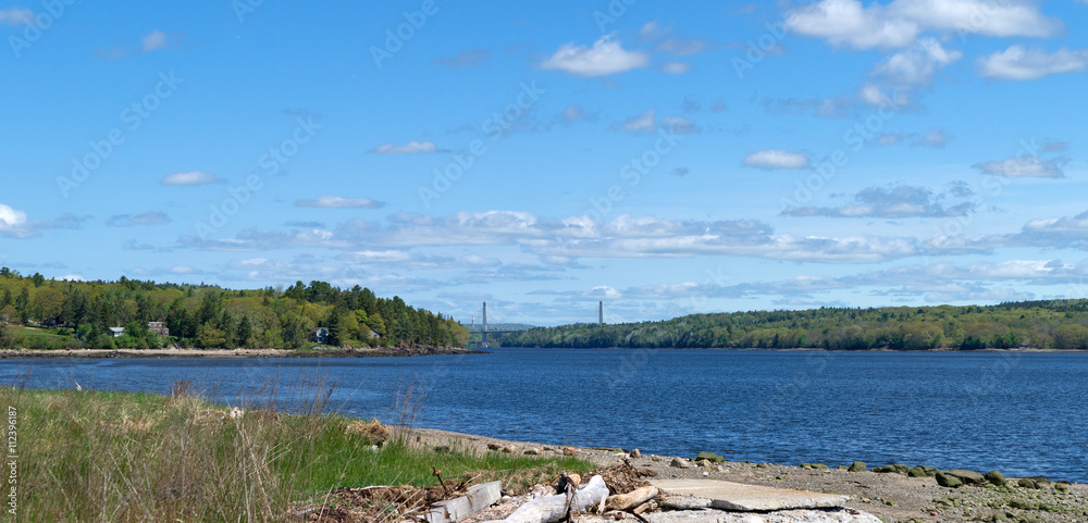 Distant view of the Penobscot Narrows Bridge from Sandy Beach in Stockton Springs Maine