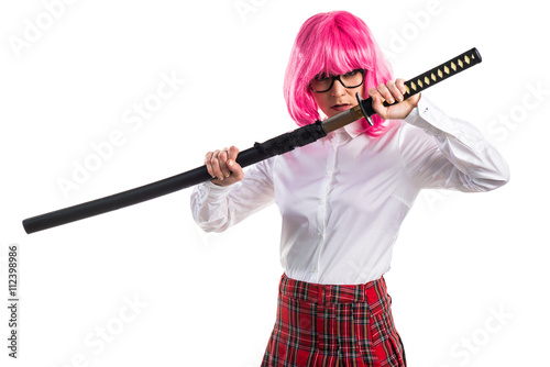 Girl with pink hair holding a katana