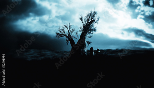 Halloween Horror Nights gravestone spooky tree 
