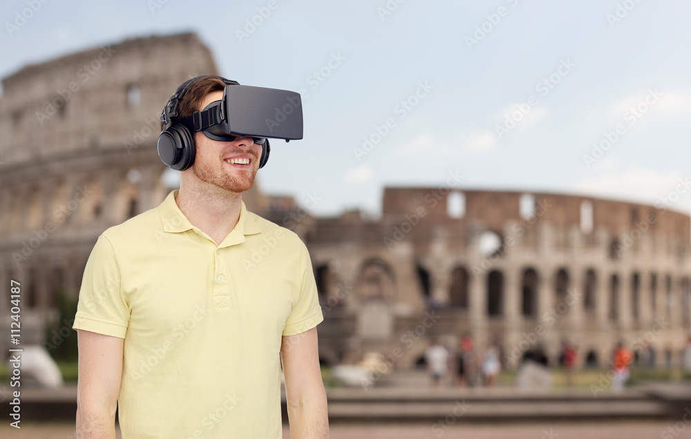 Fototapeta premium happy man in virtual reality headset or 3d glasses