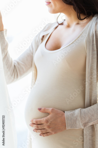 Wallpaper Mural close up of happy pregnant woman with big belly Torontodigital.ca