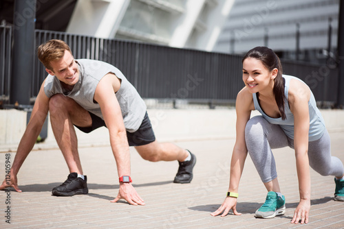 Man looking at woman ready to win