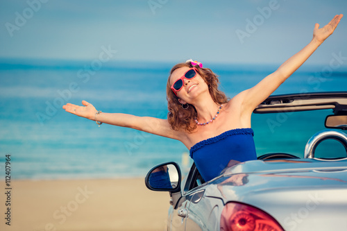 Happy woman travel by car