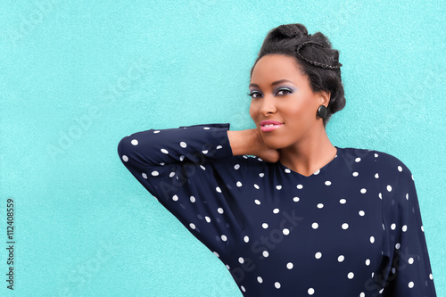 African American Woman in Hair Updo Braids and Make Up photo