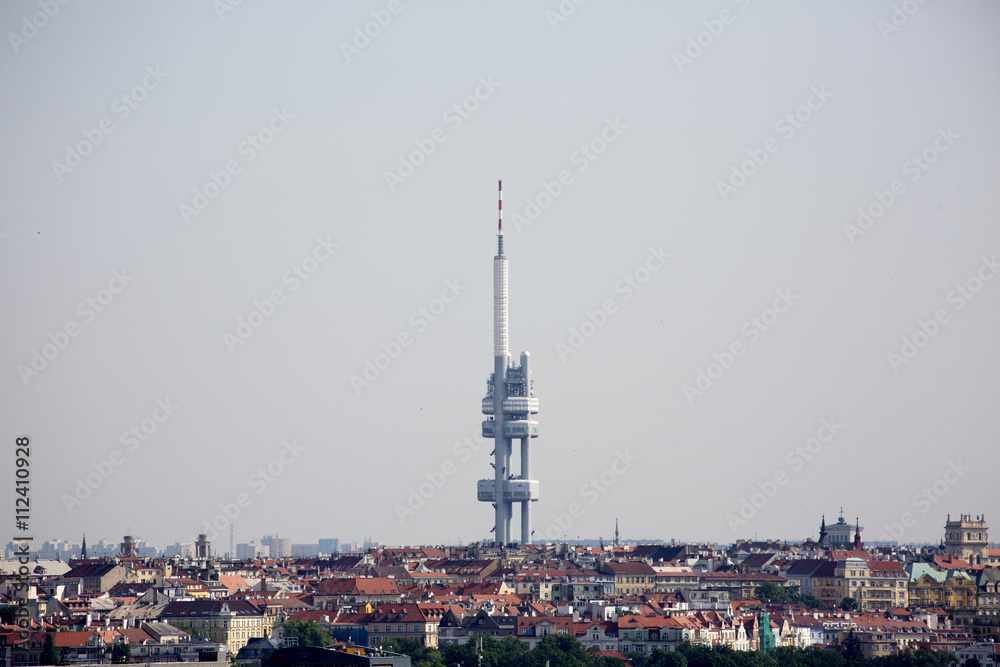Transmission tower. Tower of Zizkov. Tv tower. Futuristic technology tower in Prague. Famous cechia tower with old town. Technology tower.