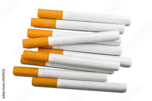 Top view of a pile of cigarettes over white background photo