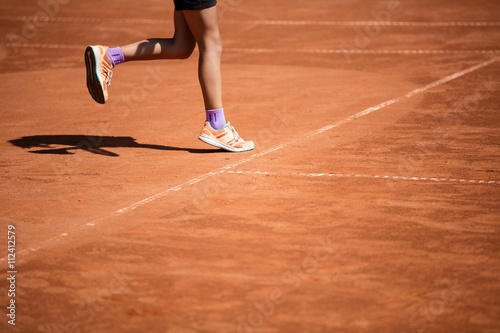Tennis game on clay court © Yordan Rusev