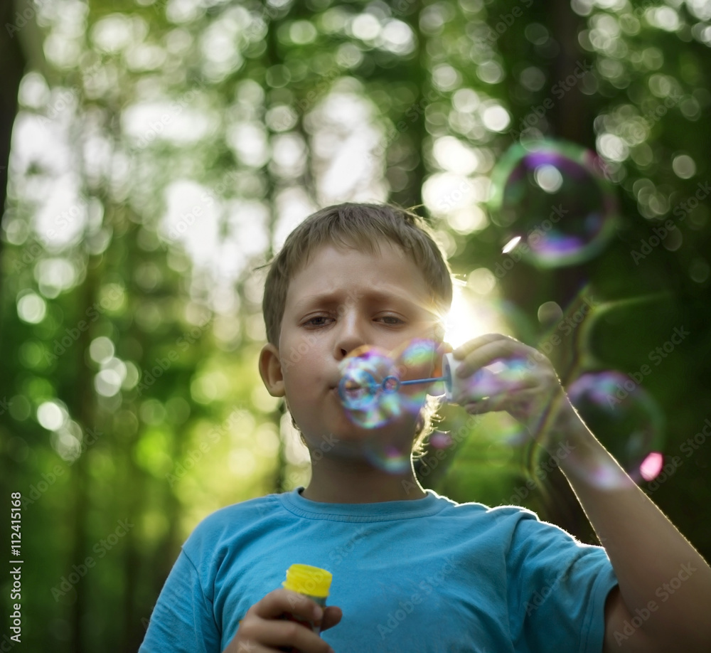 boy play in bubbles boy play in bubbles