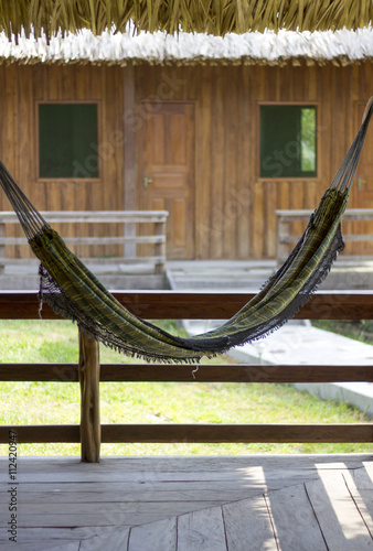 Pareidolia of a smiley face with a hammock and two windows at the background and creating a pareidolia of a smiley face photo