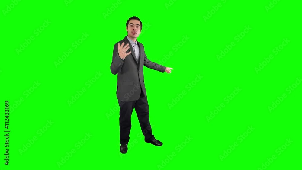 Weather man tv presenter on a green screen chroma key background easy to replace with your content. Shot in 4K UHD resolution. Weather man tv presenter on a green screen chroma key background easy to replace with your content. Shot in 4K UHD resolution.
