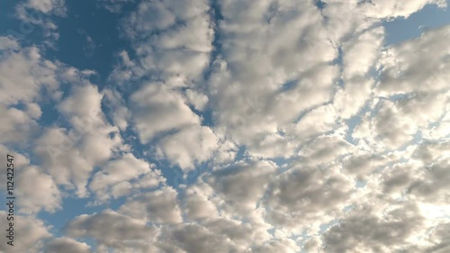 White clouds running over blue sky