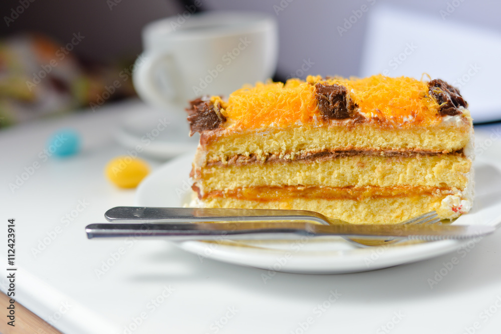 Coffee and cake on light table, closeup flat lay style top view Coffee and cake on light table, closeup flat lay style top view