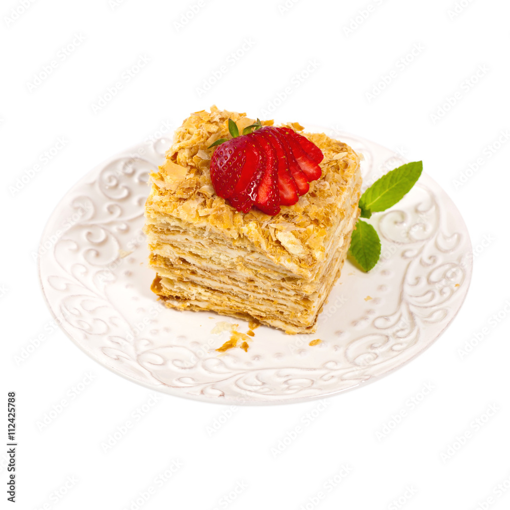 Puff Pastry Napoleon Cake Isolated on a white background. Selective focus. Puff Pastry Napoleon Cake Isolated on a white background. Selective focus.