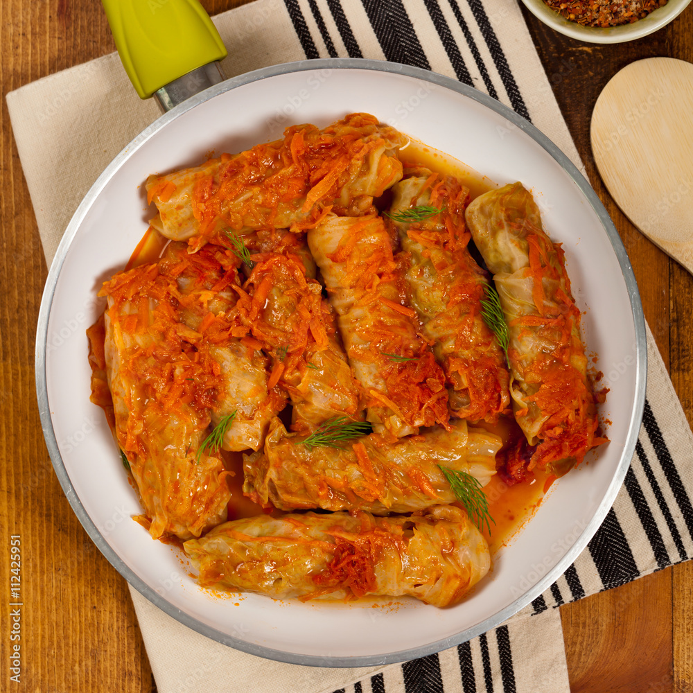 Stuffed Cabbage with tomato sauce. Selective focus. Stuffed Cabbage with tomato sauce. Selective focus.